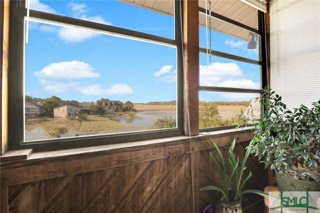 interior details featuring a water view