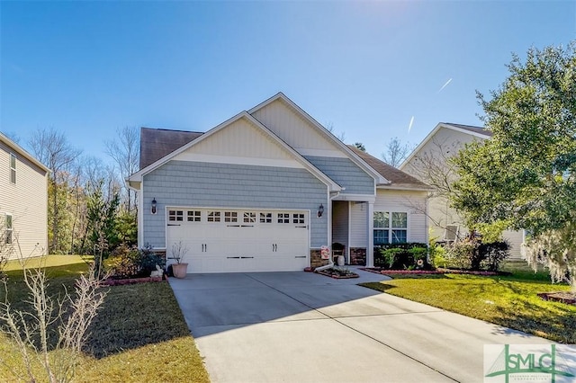 craftsman-style home featuring a garage and a front lawn