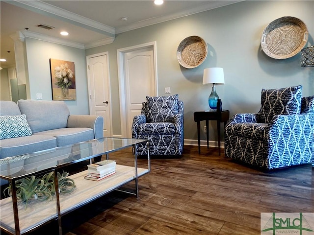 living room featuring crown molding and dark hardwood / wood-style floors