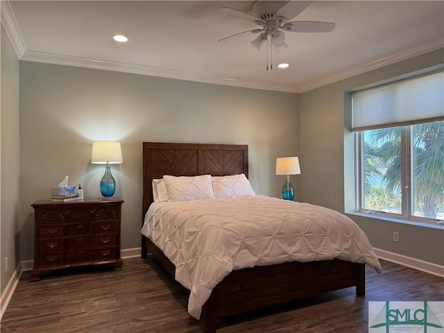 bedroom featuring ornamental molding, ceiling fan, and dark hardwood / wood-style flooring