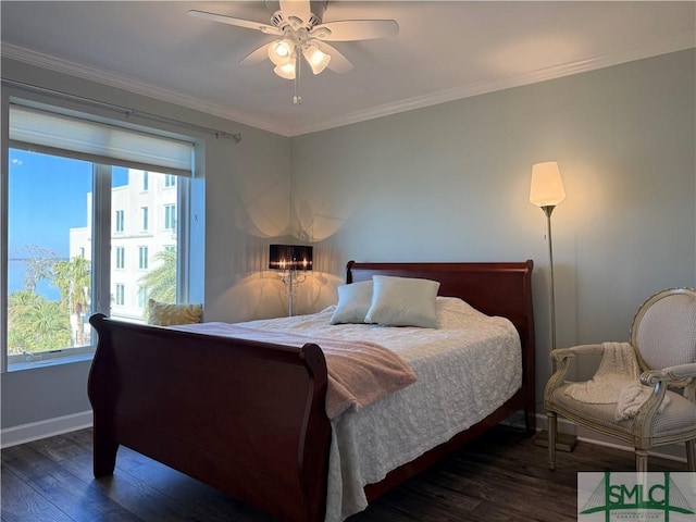 bedroom with crown molding, dark hardwood / wood-style floors, and ceiling fan