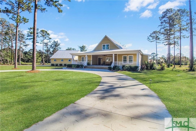 country-style home with covered porch and a front yard