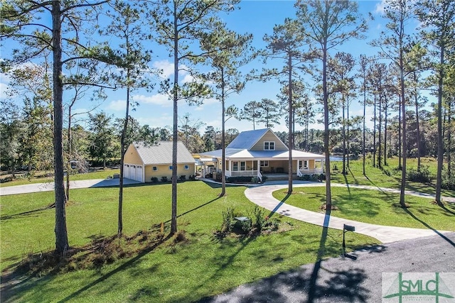 view of community featuring a yard