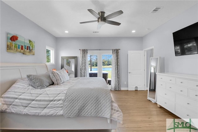 bedroom featuring access to outside, ceiling fan, and light hardwood / wood-style floors