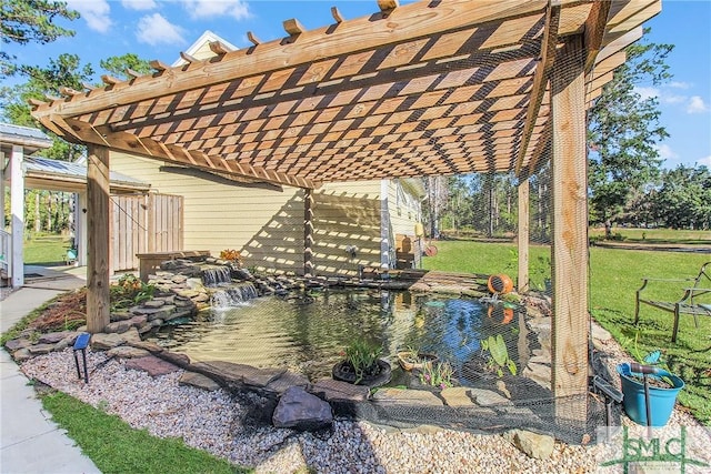 view of patio / terrace featuring a pergola and a garden pond