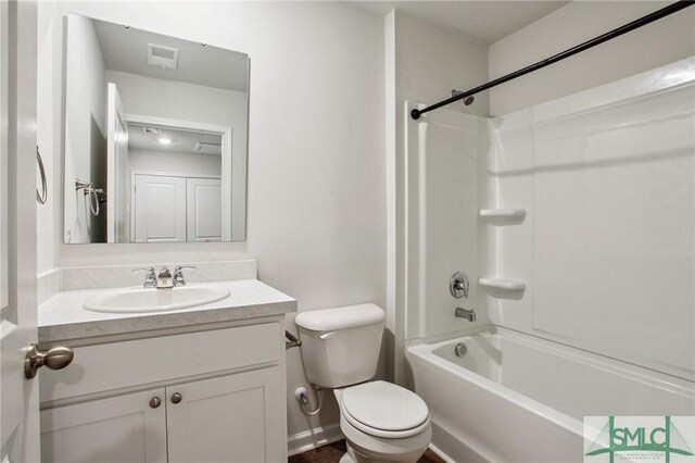 full bathroom featuring toilet, vanity, and shower / bath combination