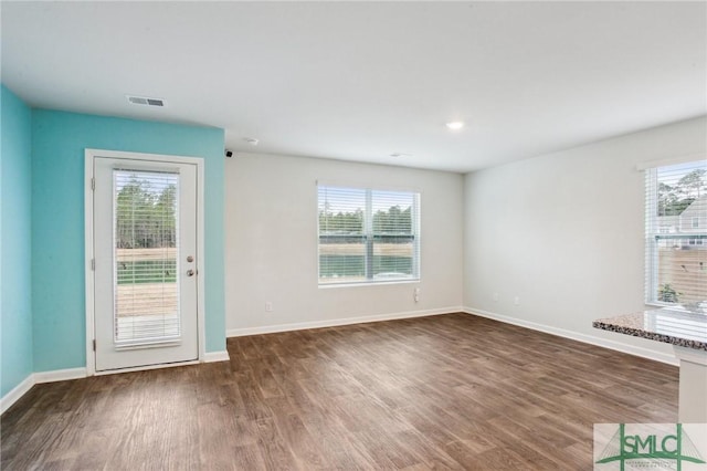 435 Salvia Rd, Bloomingdale, GA 31302 - spare room with wood finished floors, baseboards, and visible vents