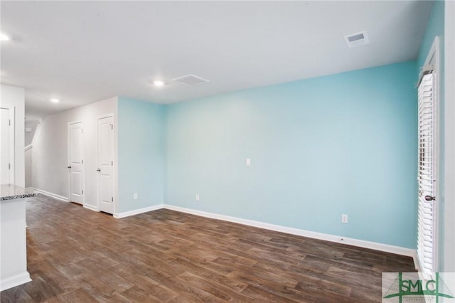 435 Salvia Rd, Bloomingdale, GA 31302 - unfurnished room with baseboards, visible vents, and dark wood finished floors