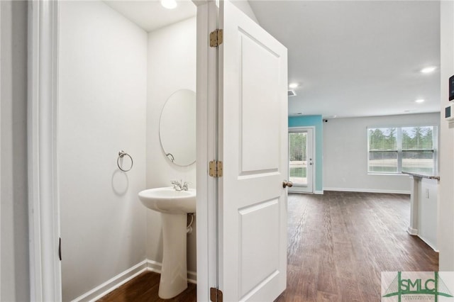 bathroom with wood-type flooring