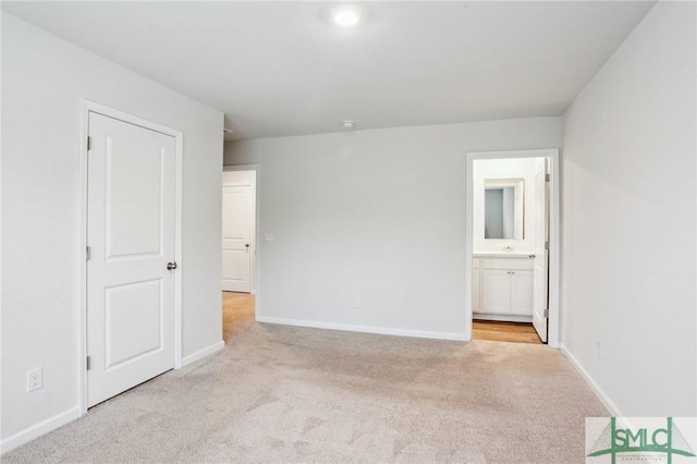 435 Salvia Rd, Bloomingdale, GA 31302 - unfurnished bedroom featuring carpet flooring, ensuite bath, and baseboards