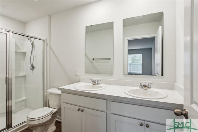 435 Salvia Rd, Bloomingdale, GA 31302 - full bathroom featuring toilet, a sink, a stall shower, and double vanity