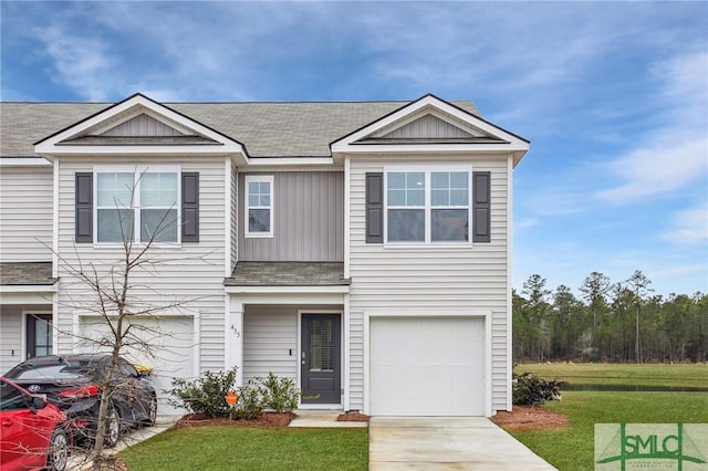 435 Salvia Rd, Bloomingdale, GA 31302 - view of front of house featuring a front yard, concrete driveway, board and batten siding, a shingled roof, and a garage
