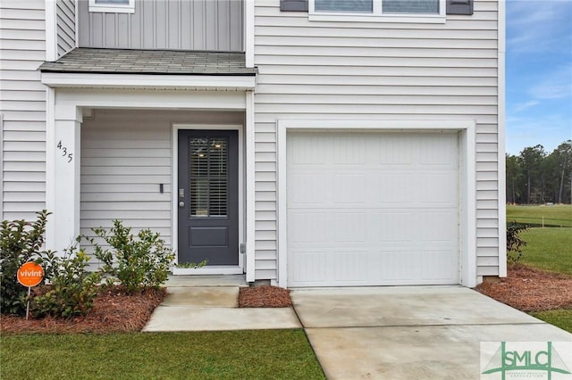 435 Salvia Rd, Bloomingdale, GA 31302 - property entrance with board and batten siding and concrete driveway