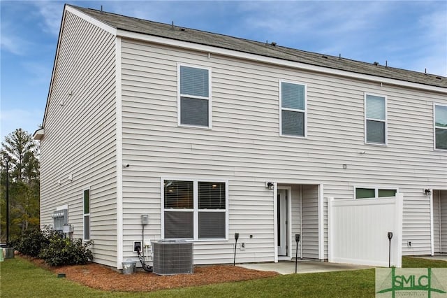 435 Salvia Rd, Bloomingdale, GA 31302 - back of house featuring a lawn, central air condition unit, and a patio