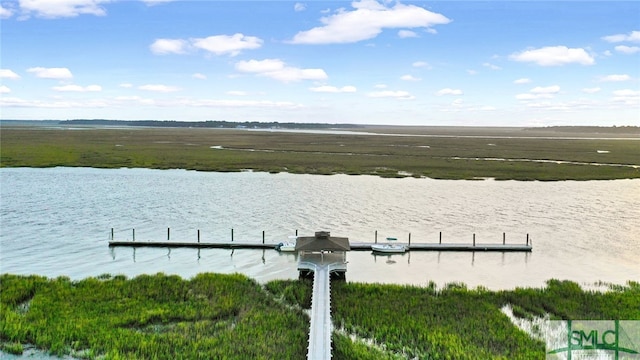 dock area featuring a water view