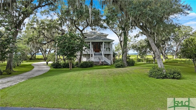 view of yard featuring a sunroom