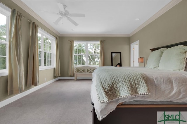 bedroom with ceiling fan, ornamental molding, and light carpet