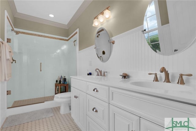 bathroom with tile patterned flooring, toilet, a shower with shower door, vanity, and ornamental molding