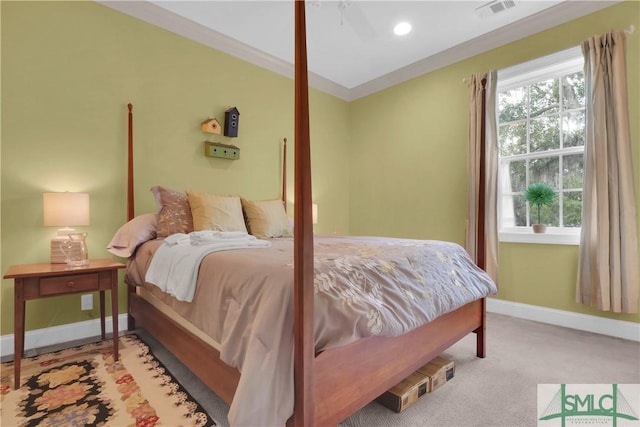 bedroom with light colored carpet and crown molding