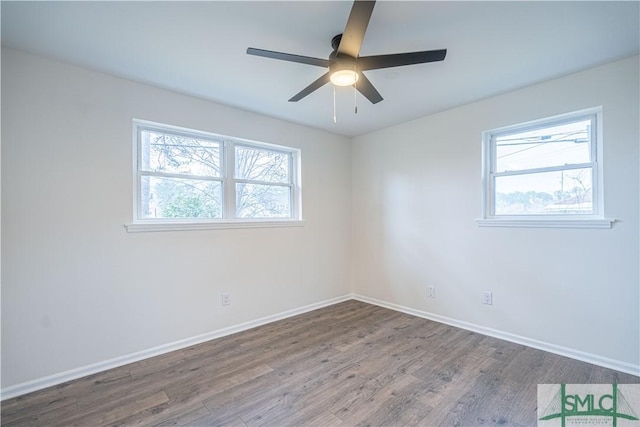 unfurnished room featuring ceiling fan and wood-type flooring