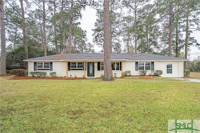 ranch-style house with a front lawn