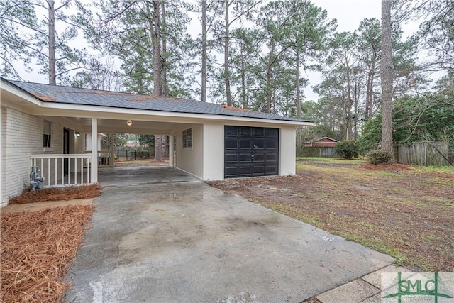 garage featuring a carport