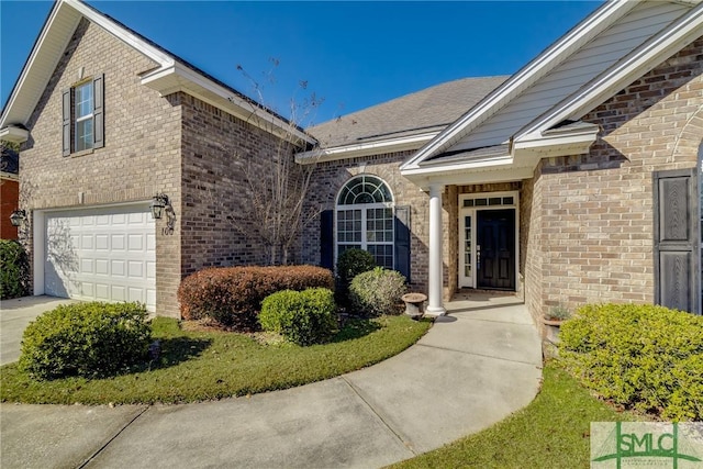 property entrance featuring a garage