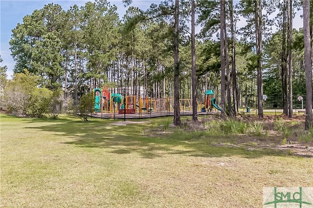 view of playground with a yard