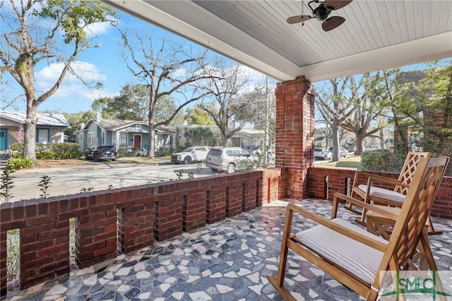 view of patio featuring covered porch and ceiling fan