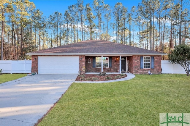 single story home featuring a front yard and a garage