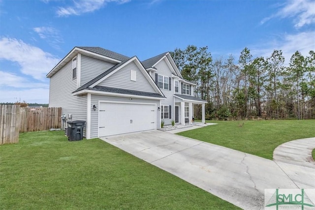 view of front of house featuring a garage and a front yard