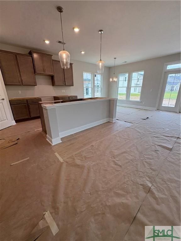 541 Sessile Oak Dr, Savannah, GA 31419 - kitchen featuring healthy amount of natural light, baseboards, hanging light fixtures, and recessed lighting