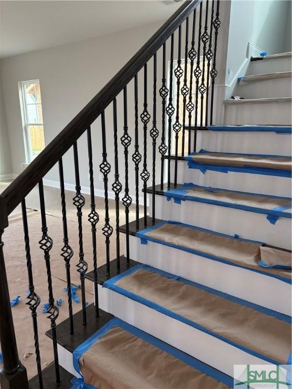 541 Sessile Oak Dr, Savannah, GA 31419 - stairway featuring baseboards