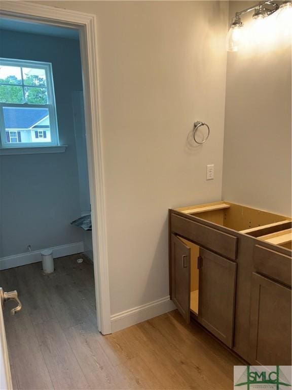 541 Sessile Oak Dr, Savannah, GA 31419 - bathroom with wood finished floors and baseboards
