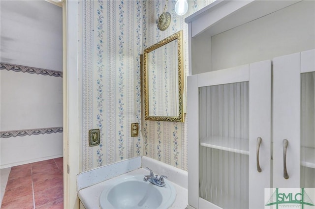 bathroom with sink and tile patterned floors