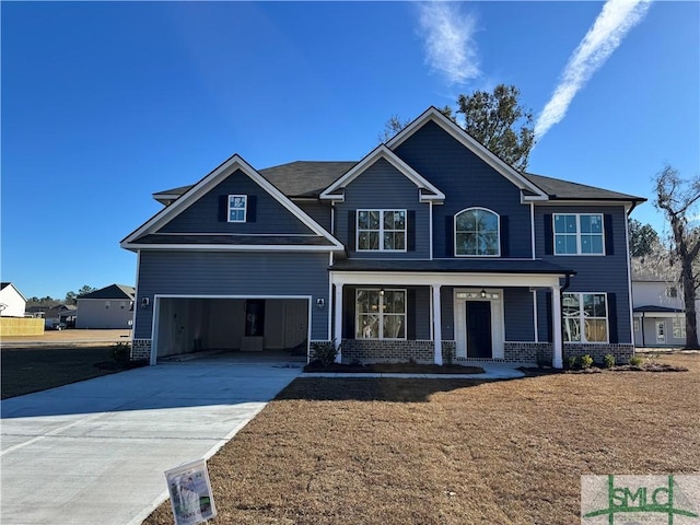 craftsman-style house with a porch and a garage