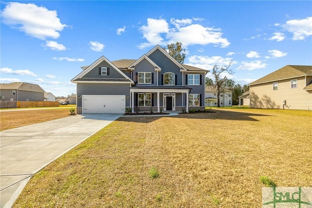 view of front of home featuring an attached garage, a porch, concrete driveway, and a front lawn