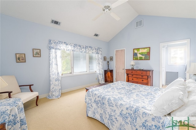 bedroom featuring high vaulted ceiling, multiple windows, ceiling fan, and carpet