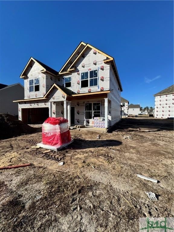 property under construction with a garage