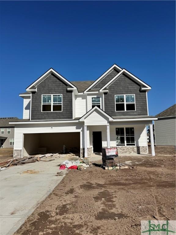 craftsman inspired home featuring a garage