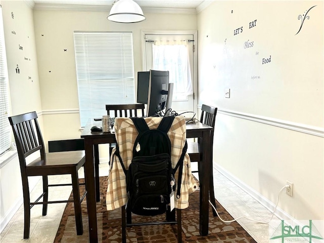 tiled dining space with ornamental molding