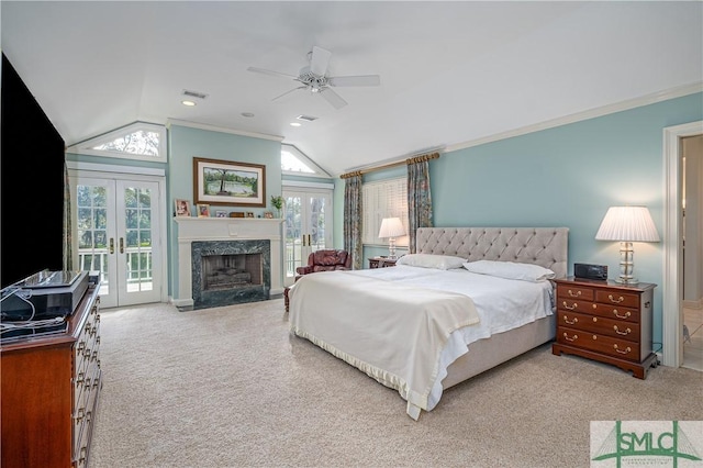 bedroom featuring light colored carpet, ceiling fan, ornamental molding, french doors, and access to outside