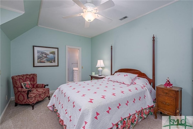 bedroom featuring vaulted ceiling, light colored carpet, ceiling fan, and connected bathroom