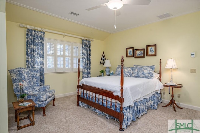 carpeted bedroom featuring ceiling fan, vaulted ceiling, and ornamental molding