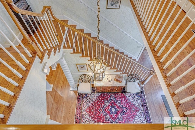 staircase with a high ceiling