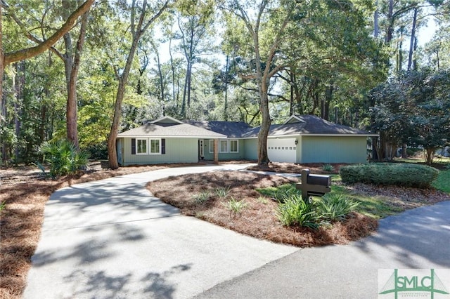 single story home with a garage