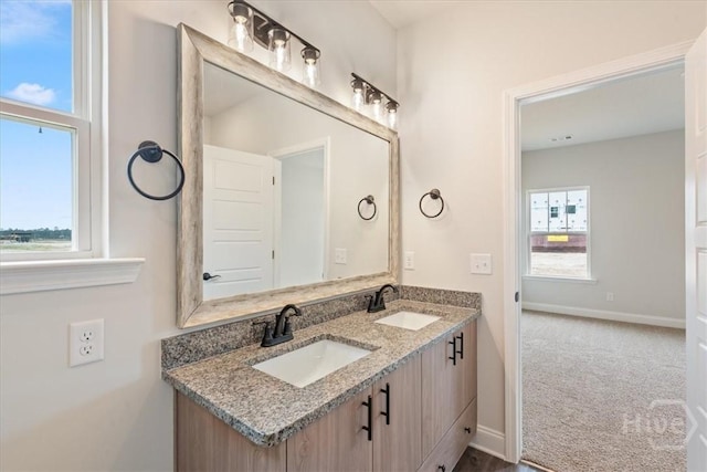 304 Timberlake Dr, Rincon, GA 31312 - bathroom featuring double vanity and baseboards