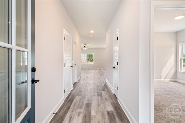 304 Timberlake Dr, Rincon, GA 31312 - hallway with recessed lighting, wood finished floors, and baseboards