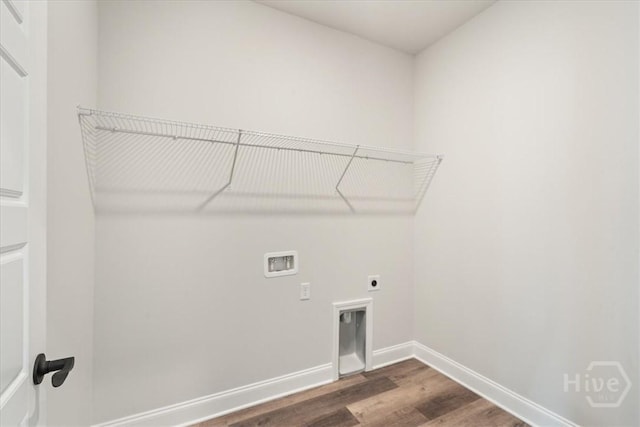 304 Timberlake Dr, Rincon, GA 31312 - laundry area featuring hookup for a washing machine, dark wood-style flooring, electric dryer hookup, and baseboards