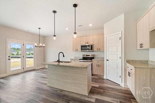 304 Timberlake Dr, Rincon, GA 31312 - kitchen with appliances with stainless steel finishes, a sink, light brown cabinetry, baseboards, and recessed lighting